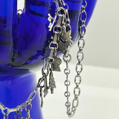 LOT 219J: Assorted Sterling Bracelets and Charms - 40 Grams( didn't weigh the 2 on packaging)