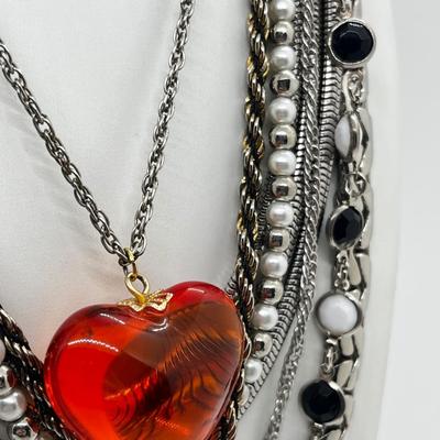 LOT 239: Silvertone and Black Necklace Collection with Showstopper Giant Red Glass Heart Shaped Pendant