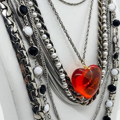 LOT 239: Silvertone and Black Necklace Collection with Showstopper Giant Red Glass Heart Shaped Pendant