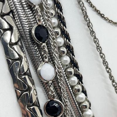 LOT 239: Silvertone and Black Necklace Collection with Showstopper Giant Red Glass Heart Shaped Pendant