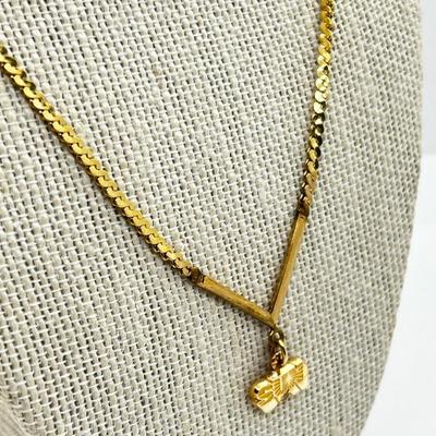 LOT 240J: 14K Yellow Gold Sun Oil Logo Charm Necklace with Diamond Chip