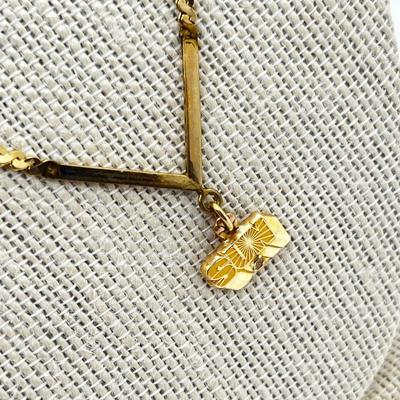 LOT 240J: 14K Yellow Gold Sun Oil Logo Charm Necklace with Diamond Chip