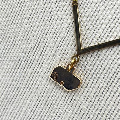 LOT 240J: 14K Yellow Gold Sun Oil Logo Charm Necklace with Diamond Chip