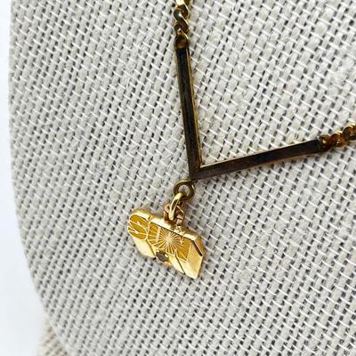 LOT 240J: 14K Yellow Gold Sun Oil Logo Charm Necklace with Diamond Chip