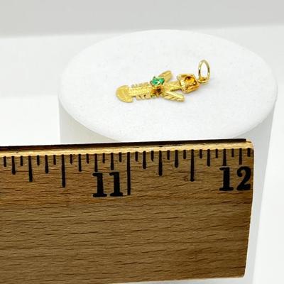 LOT 248J: 18K Yellow Gold and Emerald Chip Mayan Indian Sky God Charm - 0.7 GTW