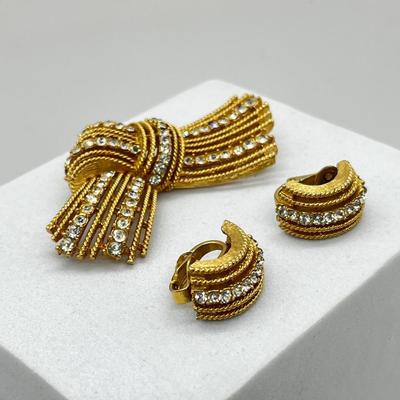 LOT 268J: Vintage Crown Trifari Goldtone Rhinestone Ribbon/Bow Brooch and Clip On Earrings