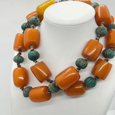 LOT 275J: Egyptian Ball Bead and Tubular Amber Necklace - 30"