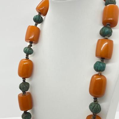 LOT 275J: Egyptian Ball Bead and Tubular Amber Necklace - 30"