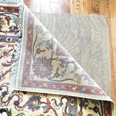 Handmade Wool Rug With an Oriental Design