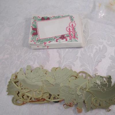 New in package 12 metal ornaments with envelopes