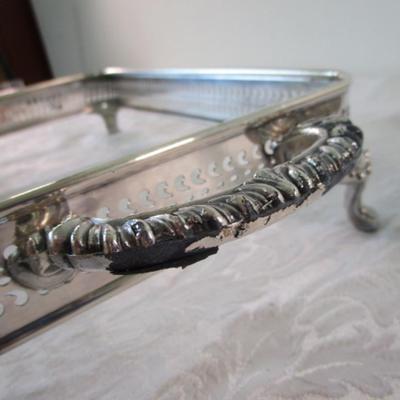 Decorative William Rogers trays to hold Pyrex dishes