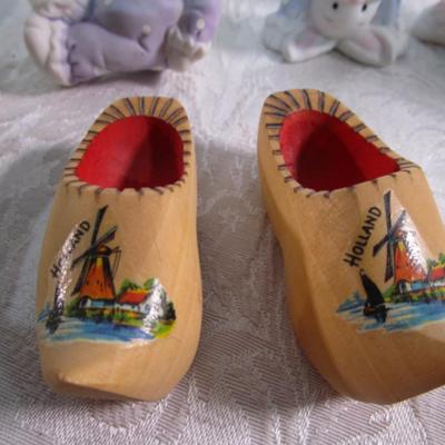 4 ceramic bunnies, 1 hand-painted ornament, 2 wooden shoes