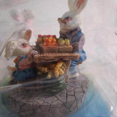 4 ceramic bunnies, 1 hand-painted ornament, 2 wooden shoes