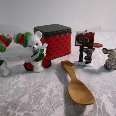 Christmas decorations, decorative wooden spoon, tin of paper coasters