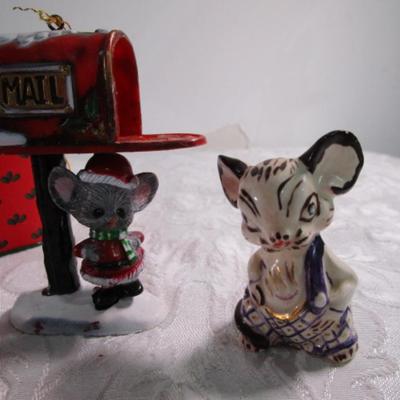 Christmas decorations, decorative wooden spoon, tin of paper coasters
