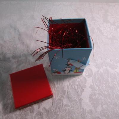 2 gift boxes, 5 sets of ornaments, suction cup wreath holder
