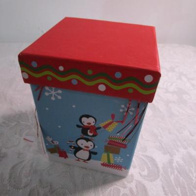 2 gift boxes, 5 sets of ornaments, suction cup wreath holder