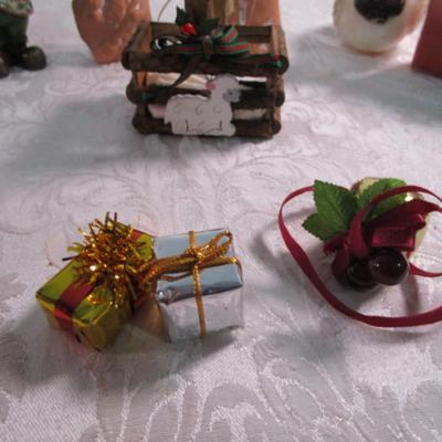 11 Christmas ornaments, 1 suction cup wreath holder, bird candle