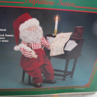 New in box Vintage Santa at the desk checking his list