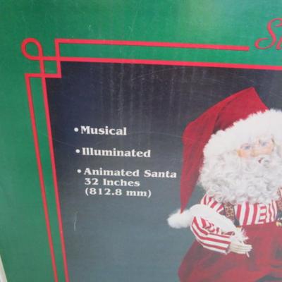 New in box Vintage Santa at the desk checking his list