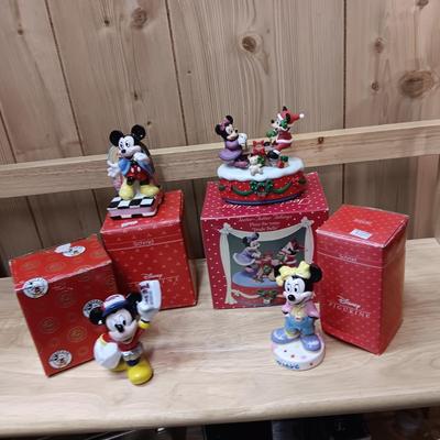 DISNEY CERAMIC FIGURINES AND MICKEY & MINNIE ON A MOVING SEESAW MUSIC BOX