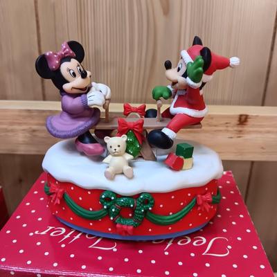 DISNEY CERAMIC FIGURINES AND MICKEY & MINNIE ON A MOVING SEESAW MUSIC BOX