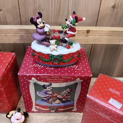 DISNEY CERAMIC FIGURINES AND MICKEY & MINNIE ON A MOVING SEESAW MUSIC BOX