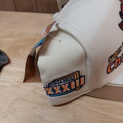 DENVER BRONCOS BALL CAP, BELT BUCKLE AND A PLUSH FOOTBALL