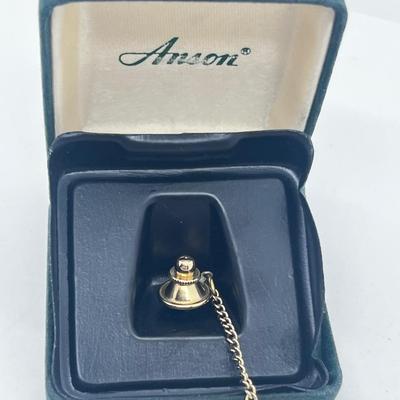 LOT 121J: Mobil Belt Buckle and Anson Tie Pin