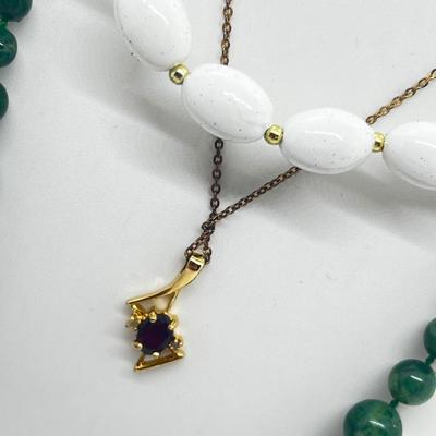 LOT 125J: Vintage Jewelry Lot: Lindenwold Jewelers Goldtone Cubic Zirconia 18" Necklace, 26" Green Beads, 18" White Beads,...