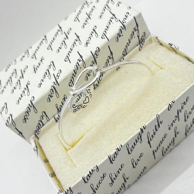 LOT 135J: Sterling Silver "Mother" Latched Bangle Bracelet -5.2 Grams