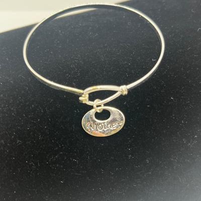 LOT 135J: Sterling Silver "Mother" Latched Bangle Bracelet -5.2 Grams
