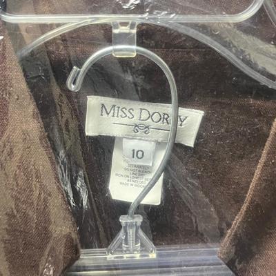 LOT 149: Collection of Vintage Women’s Clothing - Dresses, Suits and more!