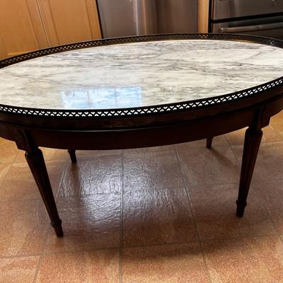 Marble top coffee table - oval