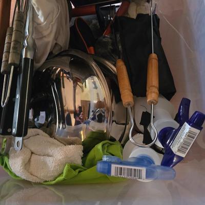 Tote of bbq equipment
