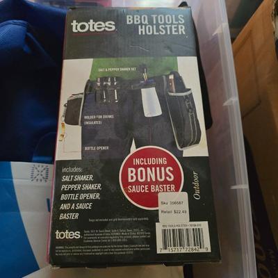Tote of bbq equipment