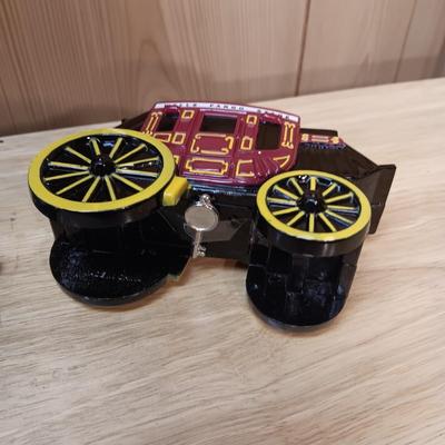 WELLS FARGO STAGECOACH BANK AND A POT METAL TOY CAR
