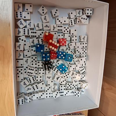 MANY CASINO DICE, POKER CHIPS AND A DECK OF CARDS