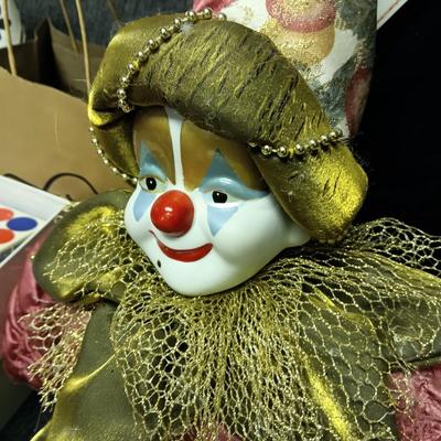 SHY GUYS LITTLE GIRL AND A PORCELAIN FACE CLOWN