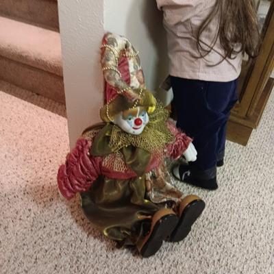 SHY GUYS LITTLE GIRL AND A PORCELAIN FACE CLOWN