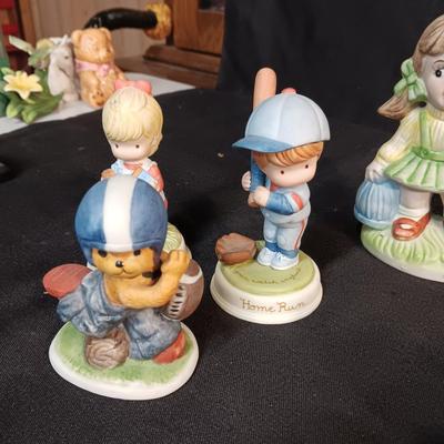 A VARIETY OF FIGURINES