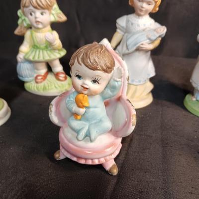 A VARIETY OF FIGURINES