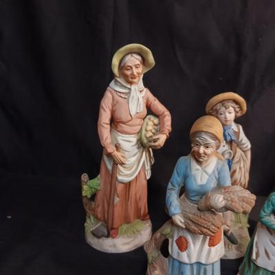 A COLLECTION OF FIGURINES