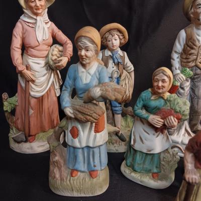 A COLLECTION OF FIGURINES