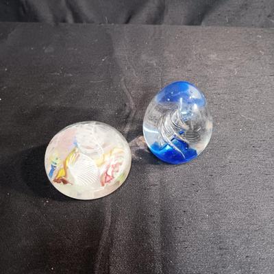 2 GLASS PAPERWEIGHTS