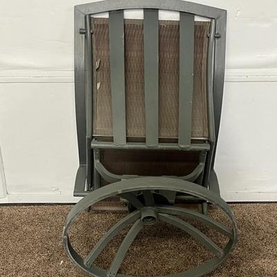 Sale Photo Thumbnail #102: Turn an ordinary outdoor space into an oasis with this Homestyles Sanibel Swivel Rocking Chair.