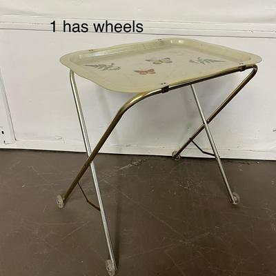 Sale Photo Thumbnail #109: Set of 4 vintage folding TV tray tables featuring classic fiberglass tops with metal legs, perfect for casual dining or retro décor.
