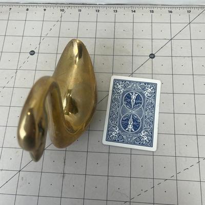 Sale Photo Thumbnail #254: A sweet little solid brass swan with a graceful s-shaped neck.