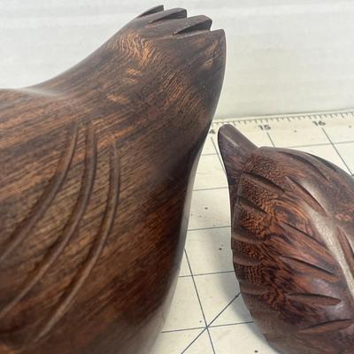 Sale Photo Thumbnail #266: Beautifully crafted set of wooden duck figurines featuring smooth, polished finishes and natural wood grain detailing.