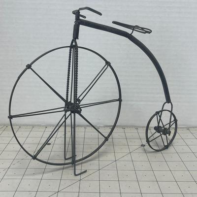 Sale Photo Thumbnail #334: The F&G Supplies Fantastic metal Penny Farthing bicycle is 8.5 inches tall, home or garden art ornament, crafted from durable metal.
